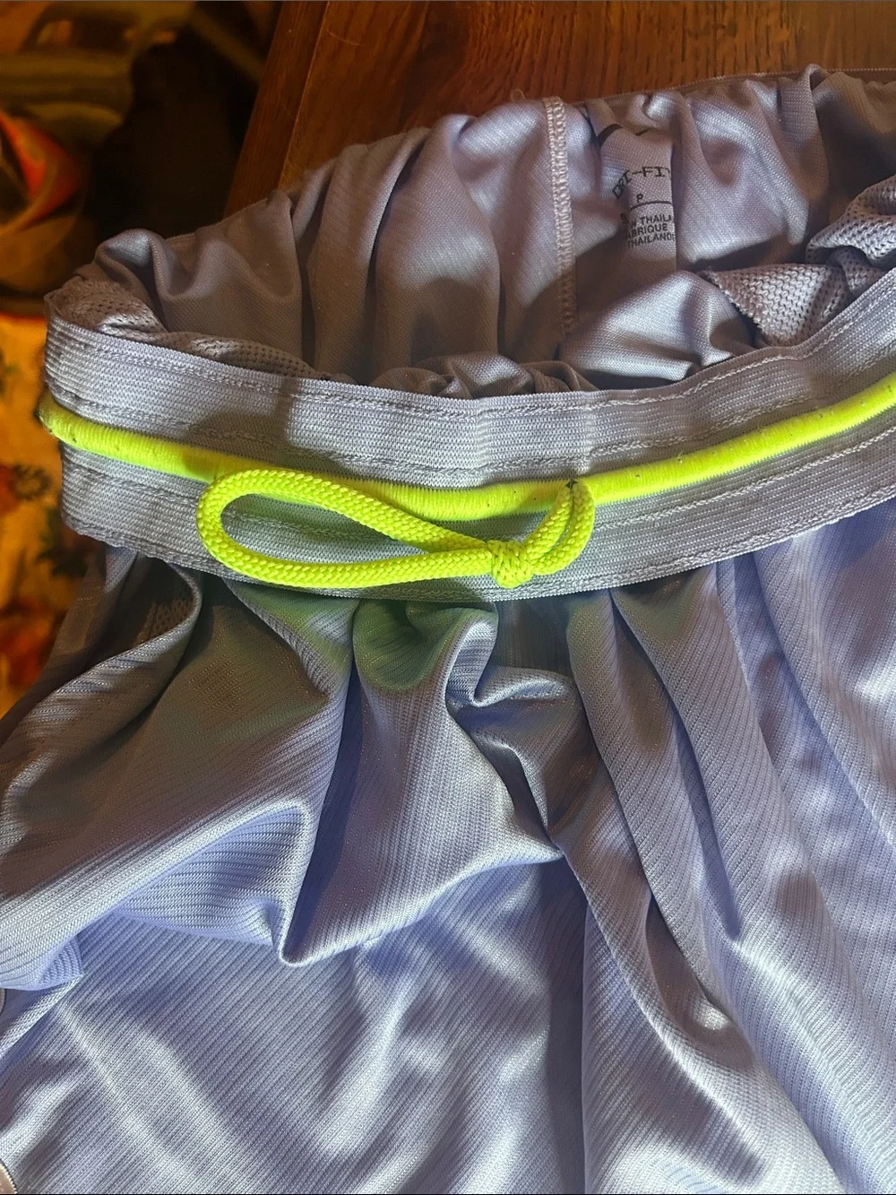 Nike Women’s Lavender Athletic Shorts with Neon Yellow Logo
